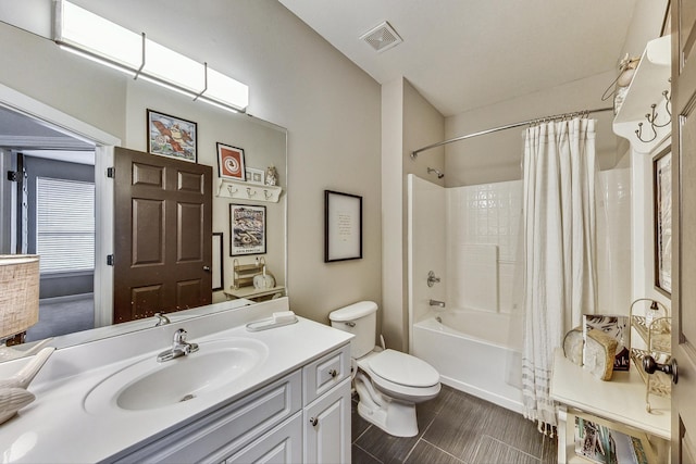 full bathroom featuring vanity, toilet, and shower / bathtub combination with curtain