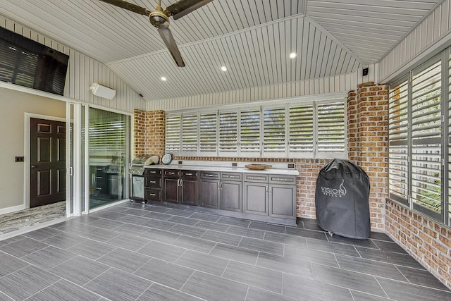 view of patio / terrace with an outdoor kitchen, area for grilling, and ceiling fan