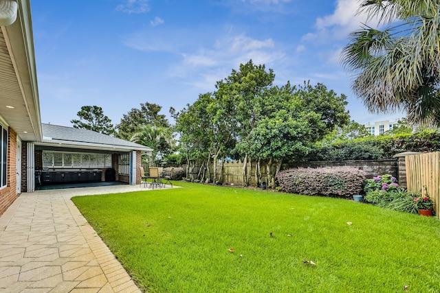 view of yard featuring a patio area