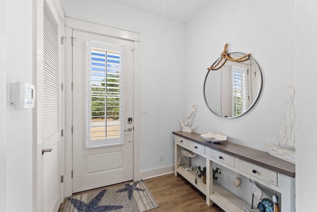 doorway to outside featuring dark hardwood / wood-style flooring