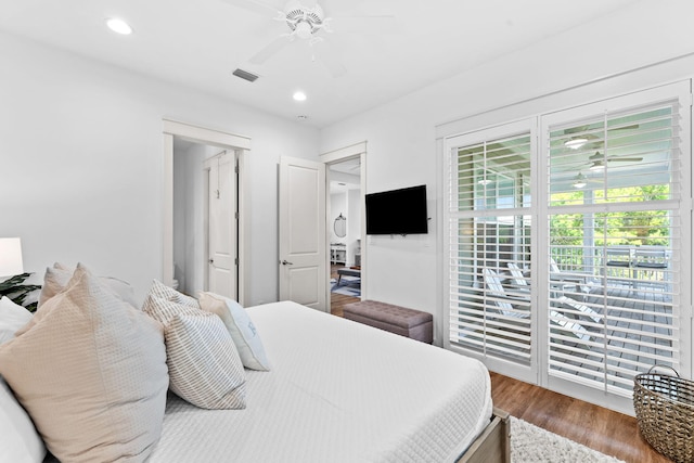 bedroom with hardwood / wood-style flooring and ceiling fan