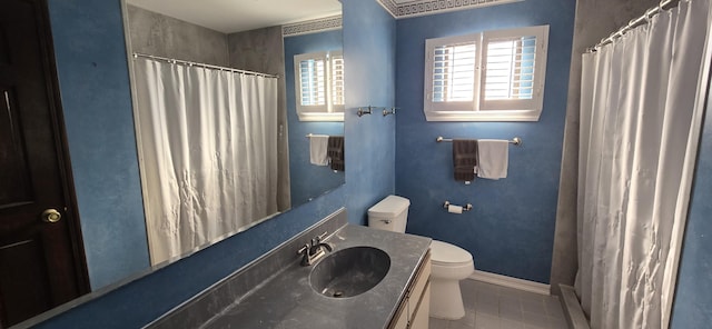 bathroom featuring toilet, vanity, tile patterned floors, and walk in shower