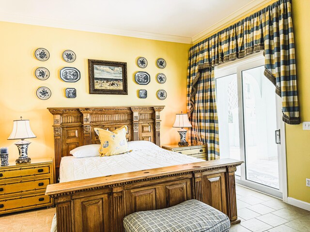 tiled bedroom with crown molding and access to outside