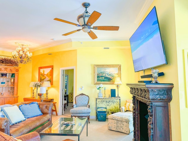 living room featuring tile patterned floors, ornamental molding, ceiling fan with notable chandelier, a fireplace, and baseboards