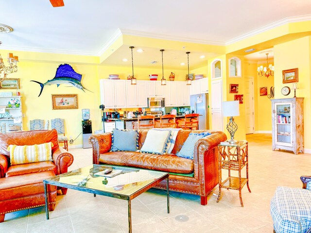 tiled living room featuring a chandelier and crown molding