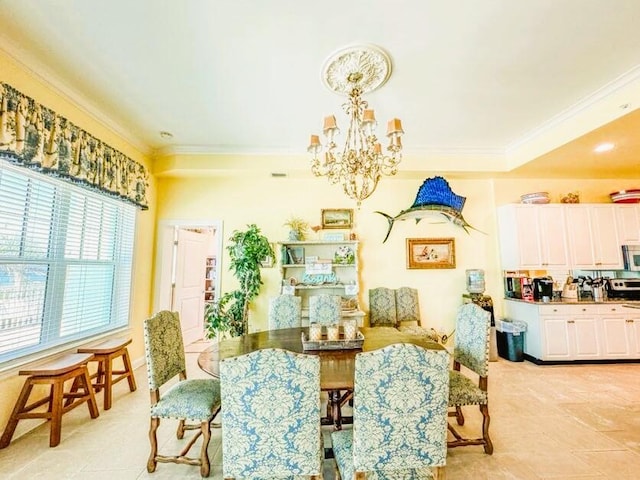 dining room with an inviting chandelier and ornamental molding