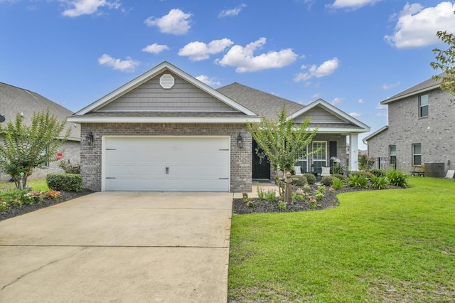 view of front of house with central AC, a garage, and a front lawn