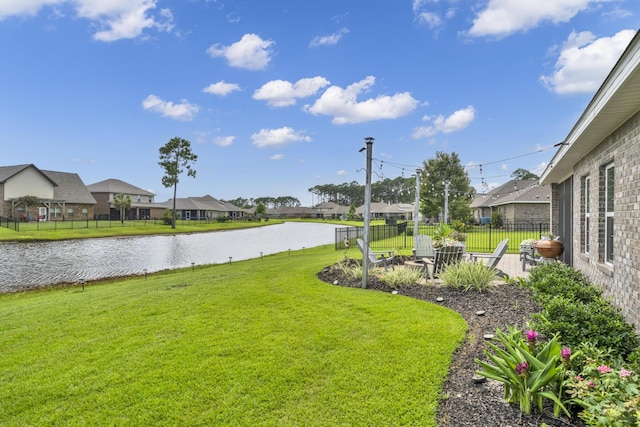 view of yard with a water view