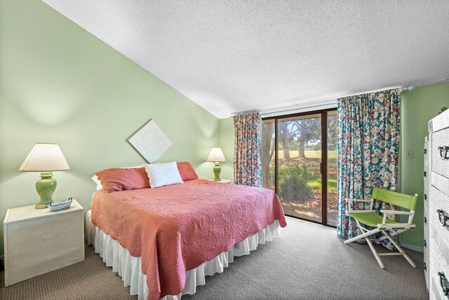 bedroom with carpet, a textured ceiling, access to outside, and vaulted ceiling