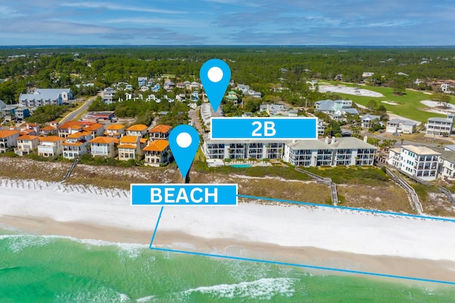 aerial view with a view of the beach and a water view