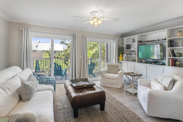 tiled living room with ceiling fan and crown molding