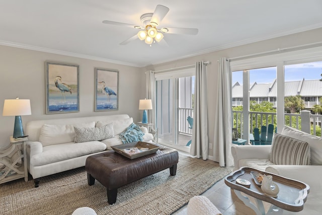 tiled living room featuring ceiling fan and ornamental molding