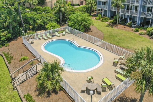 view of swimming pool with a patio