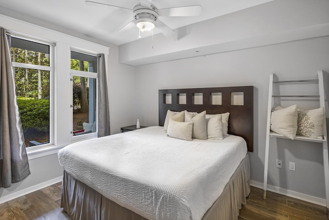 bedroom featuring dark wood-type flooring and ceiling fan