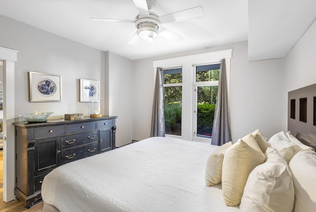 bedroom with ceiling fan and light hardwood / wood-style flooring