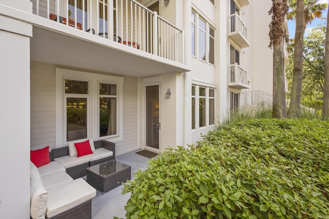 view of patio / terrace with a balcony and outdoor lounge area