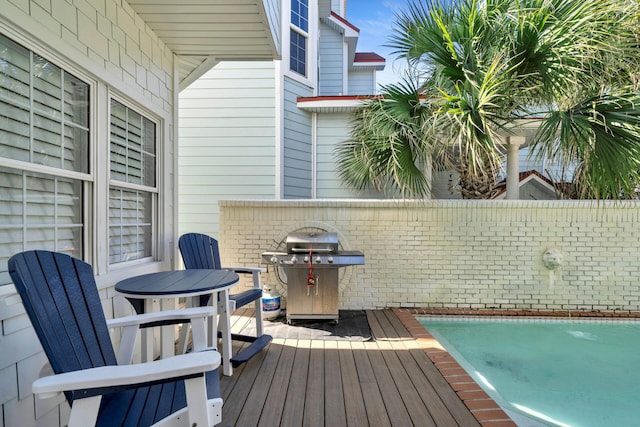 wooden terrace with grilling area