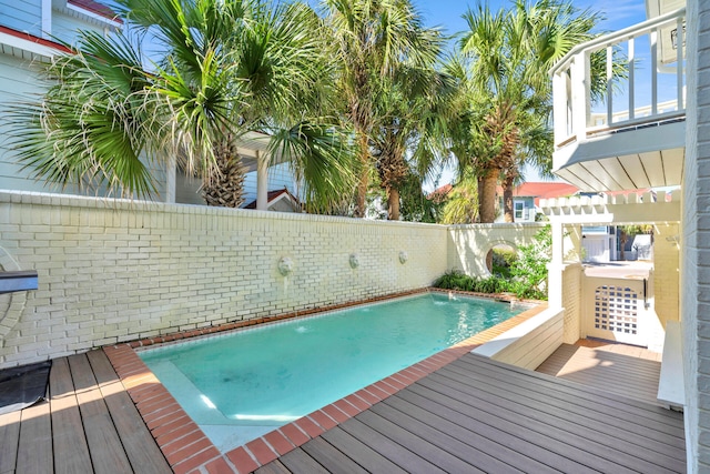 view of pool featuring a wooden deck