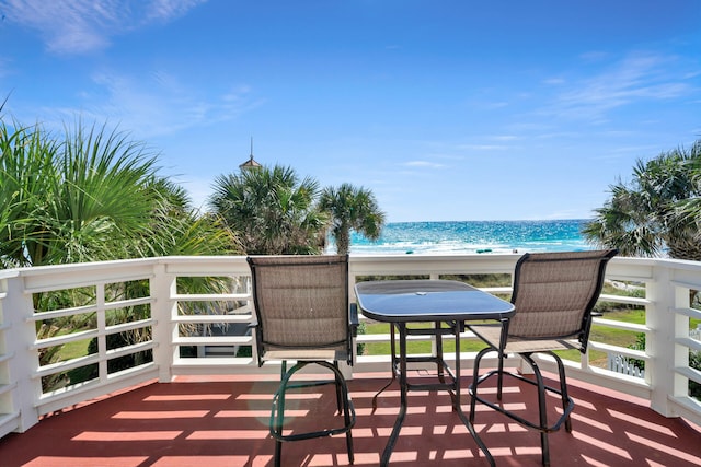 balcony featuring a water view