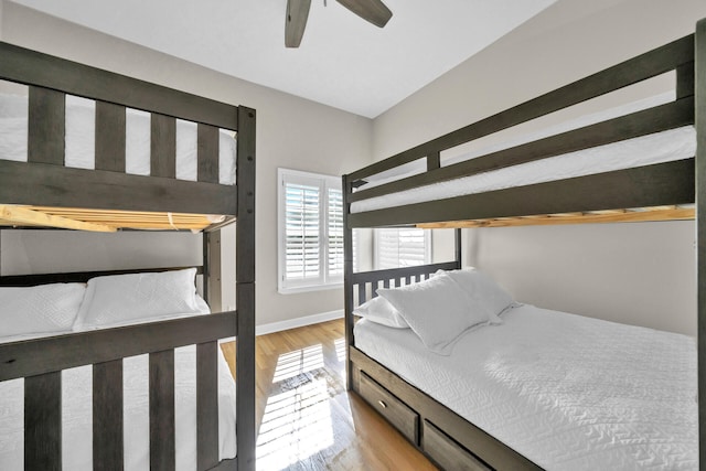 bedroom featuring ceiling fan and hardwood / wood-style flooring