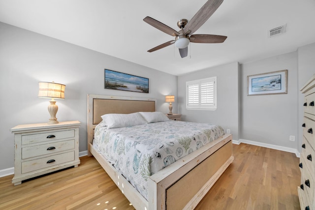 bedroom featuring light hardwood / wood-style floors and ceiling fan