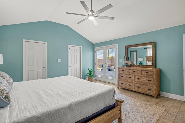 bedroom with french doors, access to outside, vaulted ceiling, ceiling fan, and light hardwood / wood-style floors