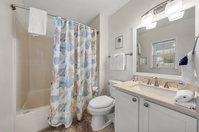 full bathroom with vanity, toilet, and shower / bath combo