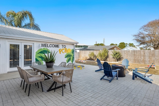 view of patio / terrace featuring a fire pit