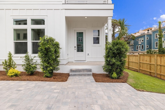 property entrance with a patio area