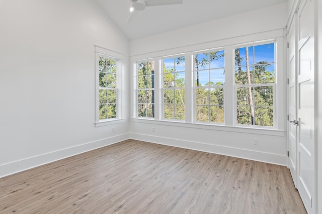 interior space featuring ceiling fan and vaulted ceiling