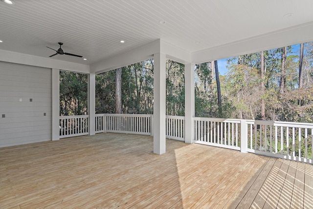 exterior space with wood ceiling, ceiling fan, and a healthy amount of sunlight