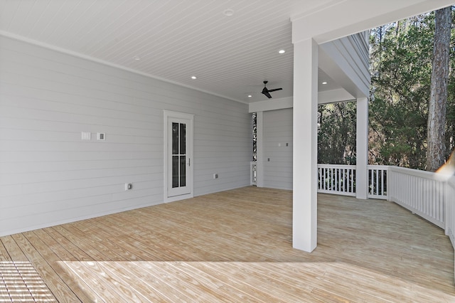 wooden deck featuring ceiling fan