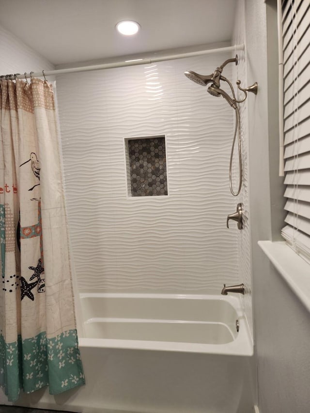 bathroom with shower / bath combo