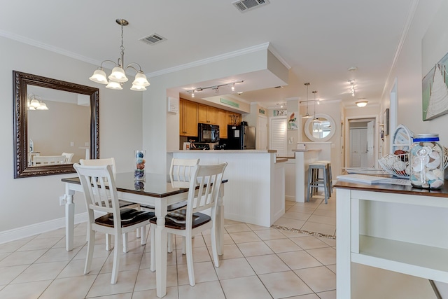 tiled dining space with crown molding and an inviting chandelier