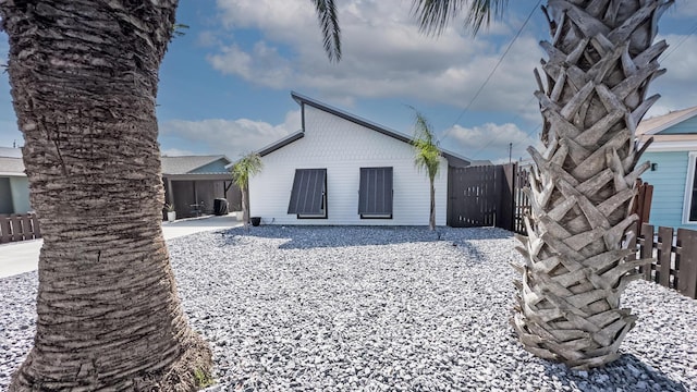 back of property featuring a patio area