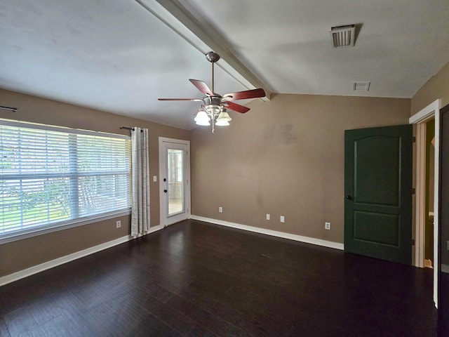 unfurnished room with ceiling fan, dark hardwood / wood-style flooring, and lofted ceiling with beams