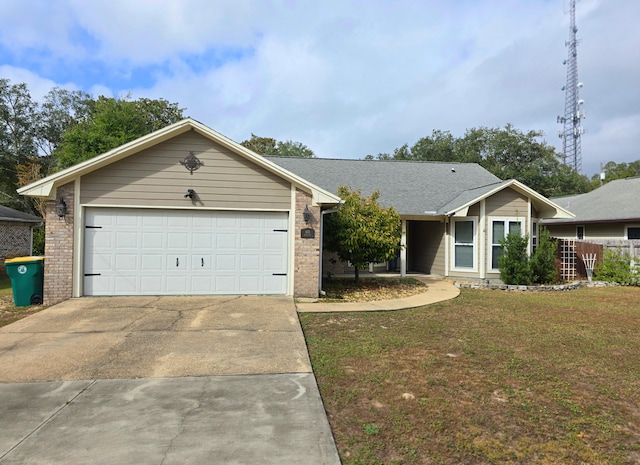 ranch-style house featuring a garage and a front lawn