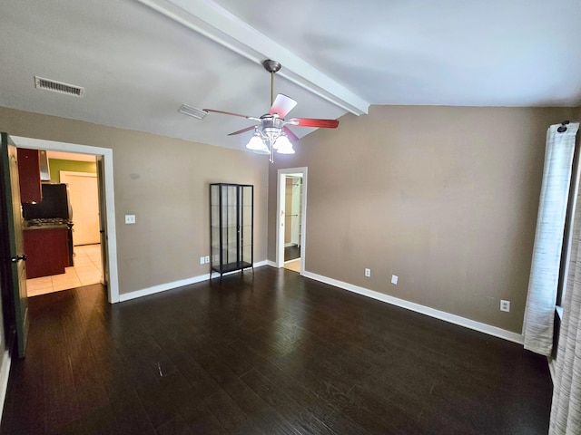 interior space with hardwood / wood-style floors, vaulted ceiling with beams, and ceiling fan