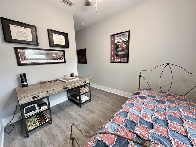 bedroom featuring dark hardwood / wood-style floors