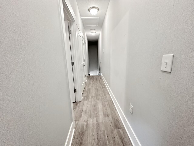 hallway featuring light wood-type flooring