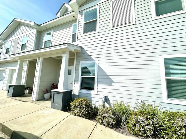 doorway to property featuring a patio area