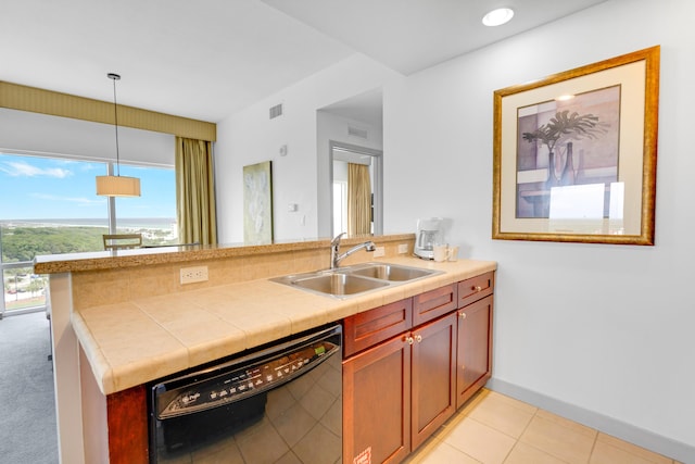 kitchen with dishwasher, kitchen peninsula, sink, and hanging light fixtures