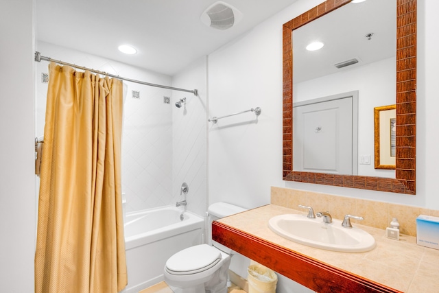 full bathroom with toilet, sink, and shower / tub combo with curtain