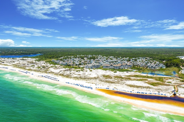 aerial view featuring a view of the beach and a water view