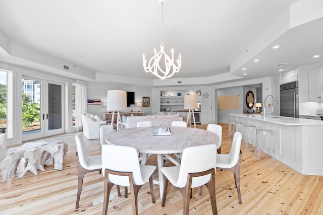 37 S Compass Point Way Unit 107, Inlet Beach, FL 32461 - dining area featuring a chandelier, light wood-style floors, and recessed lighting