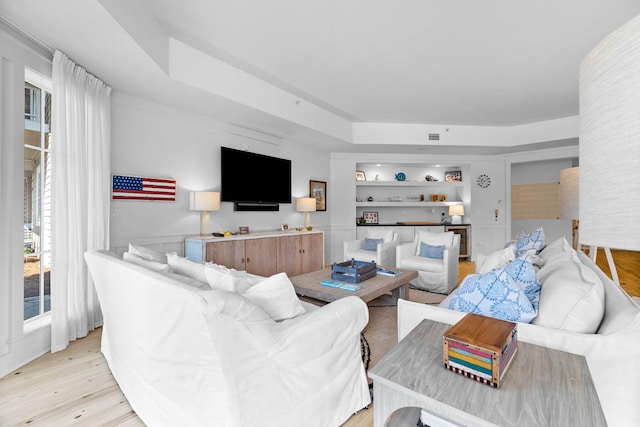 37 S Compass Point Way Unit 107, Inlet Beach, FL 32461 - living room featuring light wood finished floors and built in features