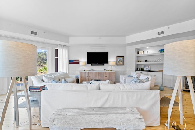 37 S Compass Point Way Unit 107, Inlet Beach, FL 32461 - living room with light wood-style floors and built in features