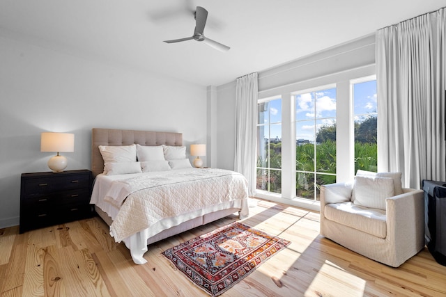 37 S Compass Point Way Unit 107, Inlet Beach, FL 32461 - bedroom with light wood-style flooring and a ceiling fan