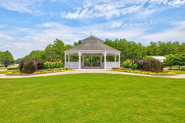 view of home's community featuring a gazebo and a yard