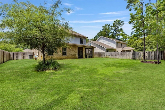 view of yard with a sunroom